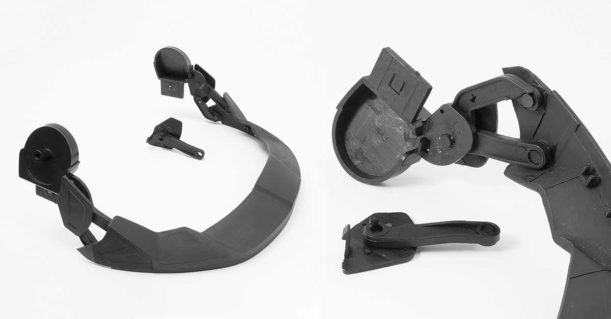 Meccanismo di apertura per casco prodotto con compound LATI ad alta resistenza meccanica e stabilità dimensionale per garantire sicurezza e durata